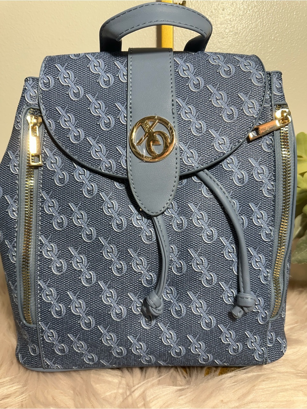 XOXO blue Patterned Drawstring Backpack with Gold Accent
